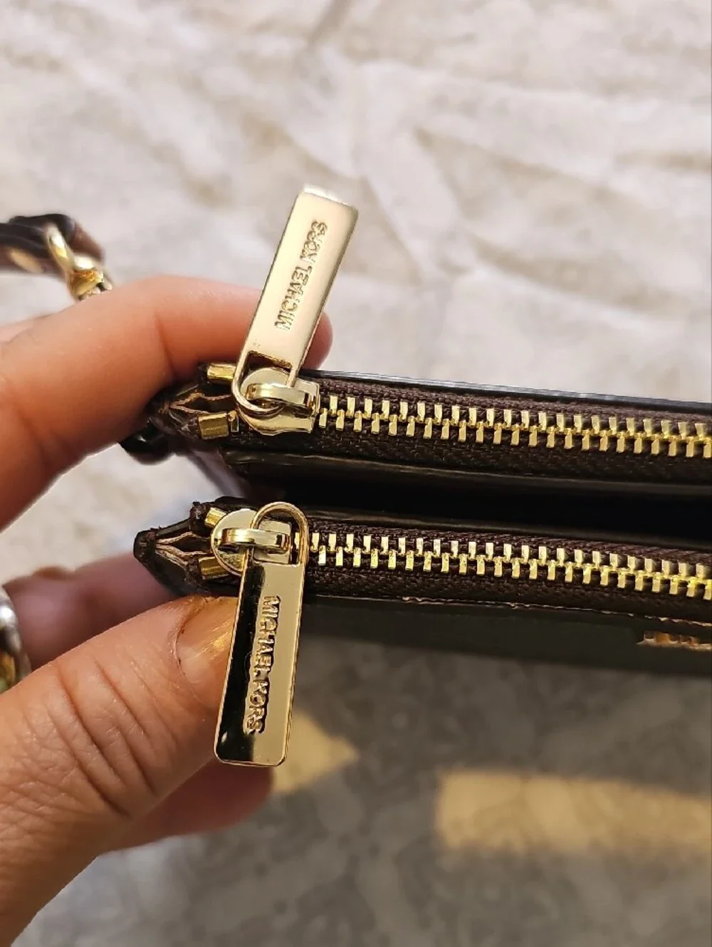 Michael Kors Brown Signature Wristlet with Gold Logo